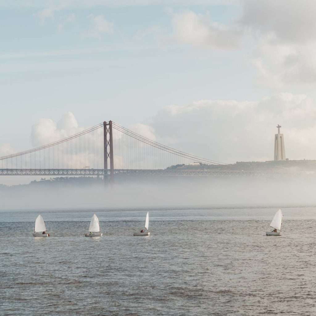 Misty Tagus river with sailboats