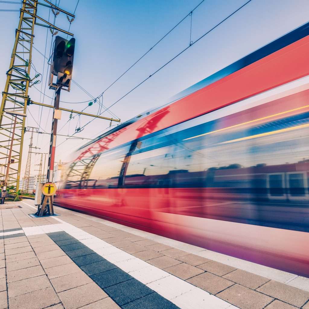 High speed train in motion on the railway station