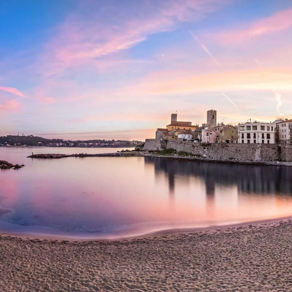 View of Antibes on sunset from plage, French Riviera, France